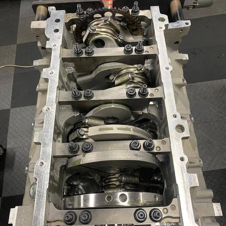 Stroker crankshaft and rods installed under torqued main caps in a 416ci LS short block
