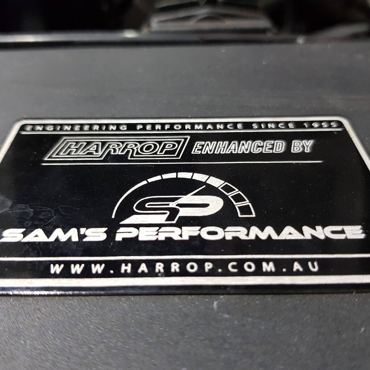 "Harrop Enhanced by Sam's Performance" plaque on a supercharger installed by Sam's Performance