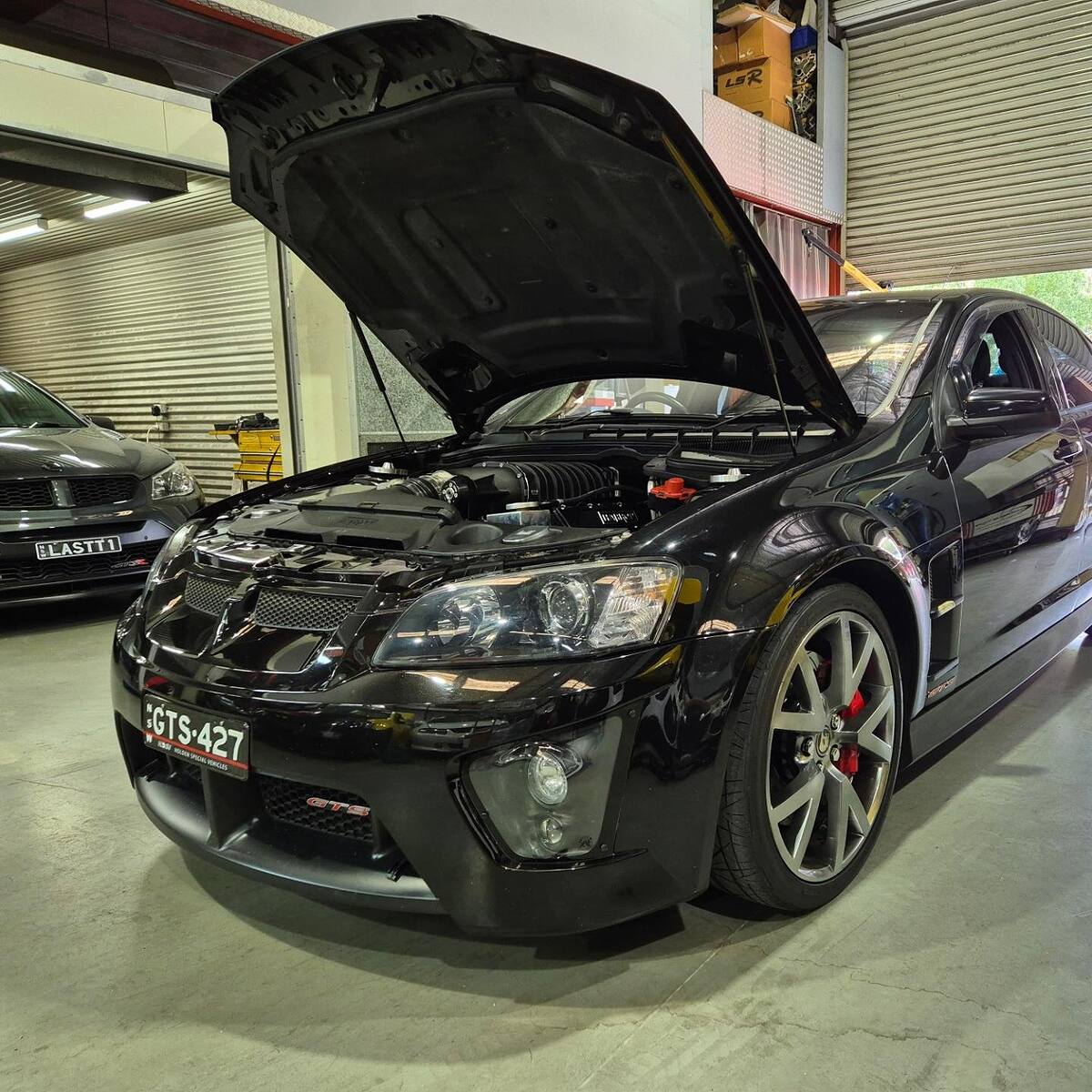 Black HSV VE GTS with a Harrop blower and Sam's Performance cam and lifter package