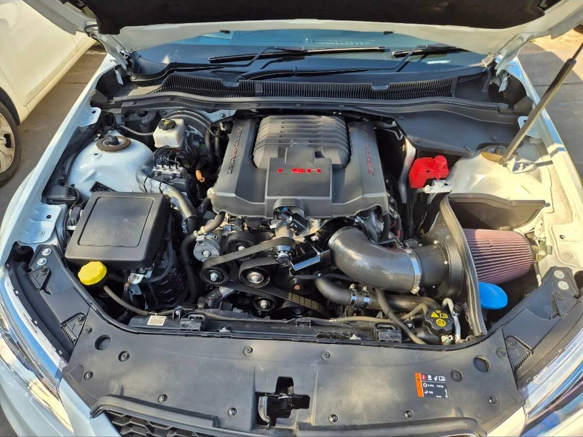 LSA engine bay of a white HSV VF Clubsport with Higgins CC-ported heads, cam and lifter package and Harrop boosted pulleys and airbox