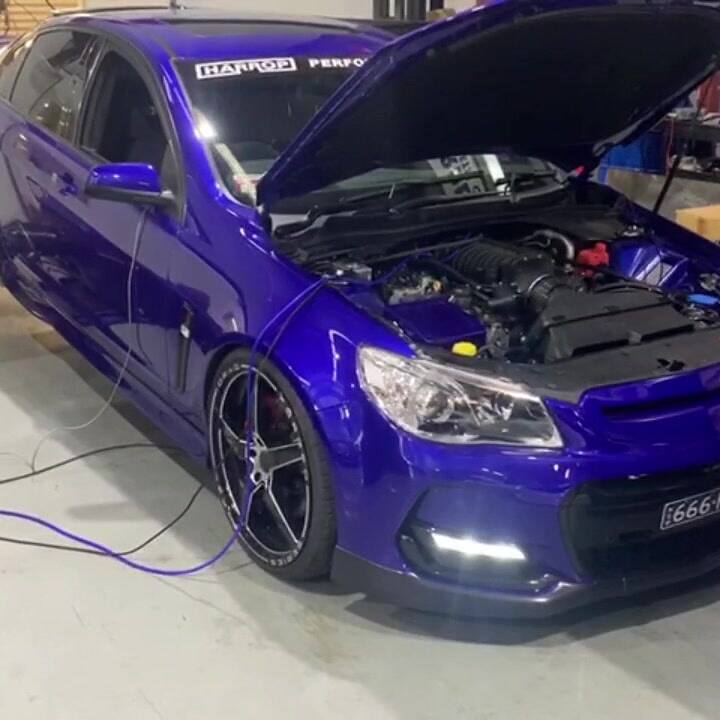 Blue VF with an LSX 427, Mast Motorsport heads and Harrop 2650 blower on E85, strapped to the hub dyno